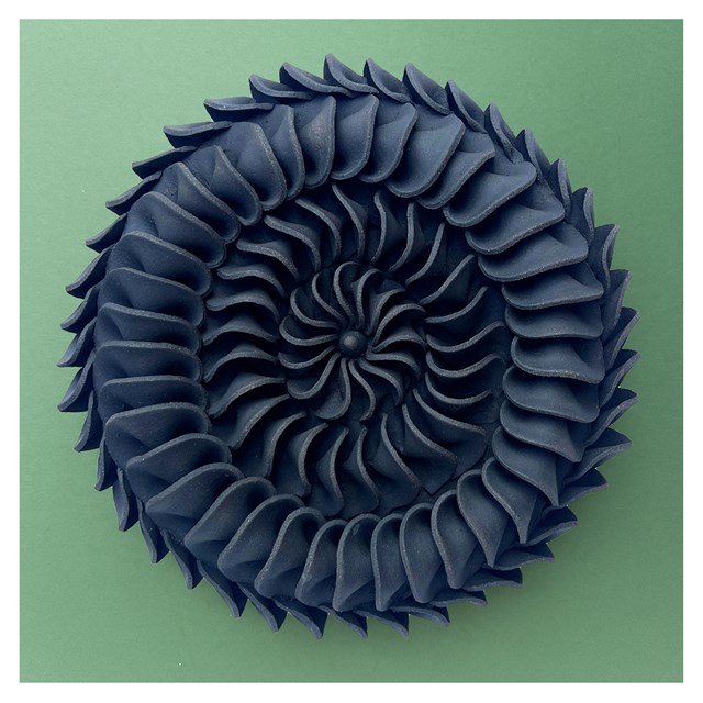Folded wall piece